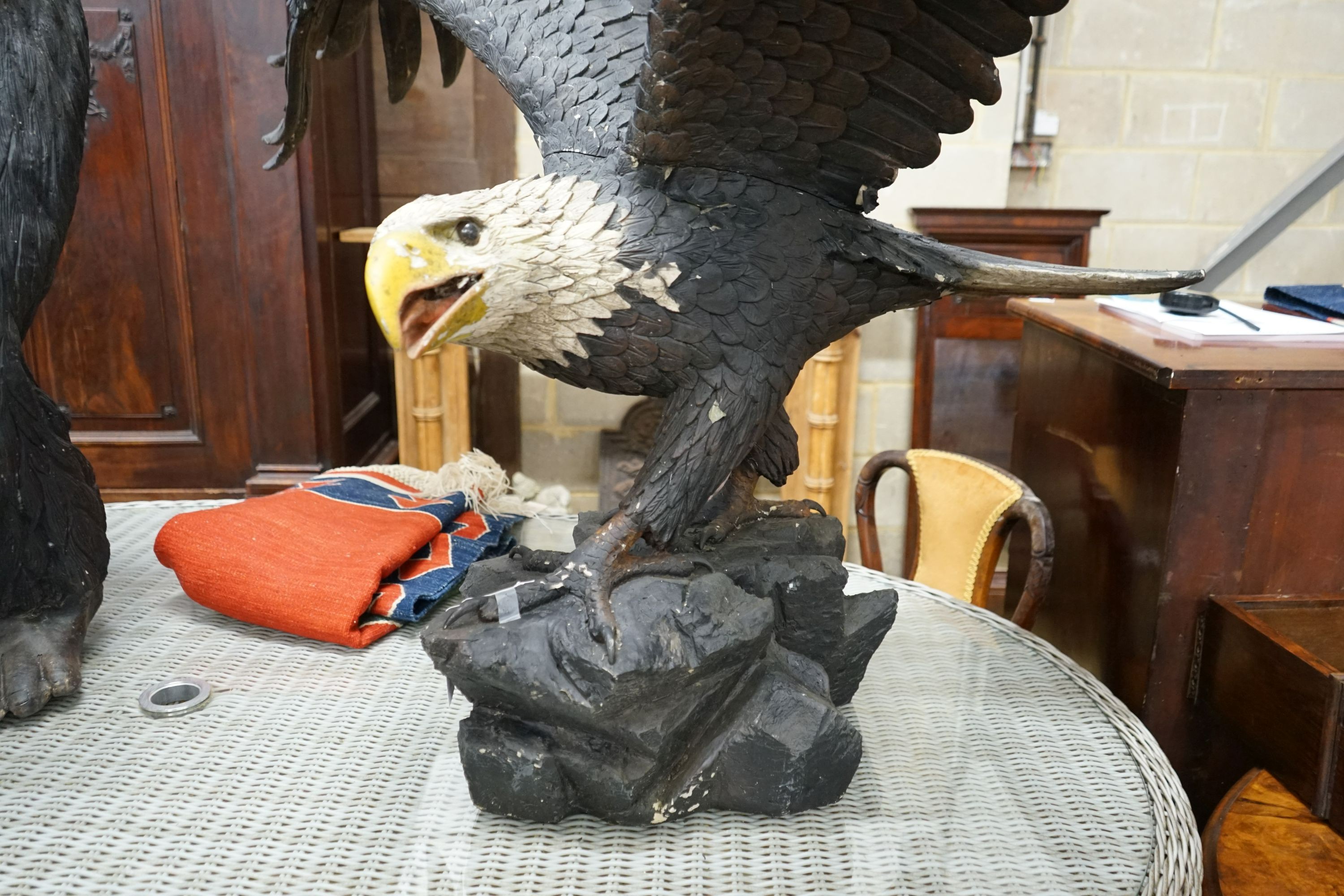 A large composition Golden Eagle garden ornament, height 90cm, width 165cm
